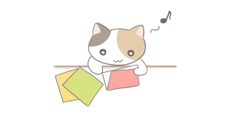 折り紙をする猫
