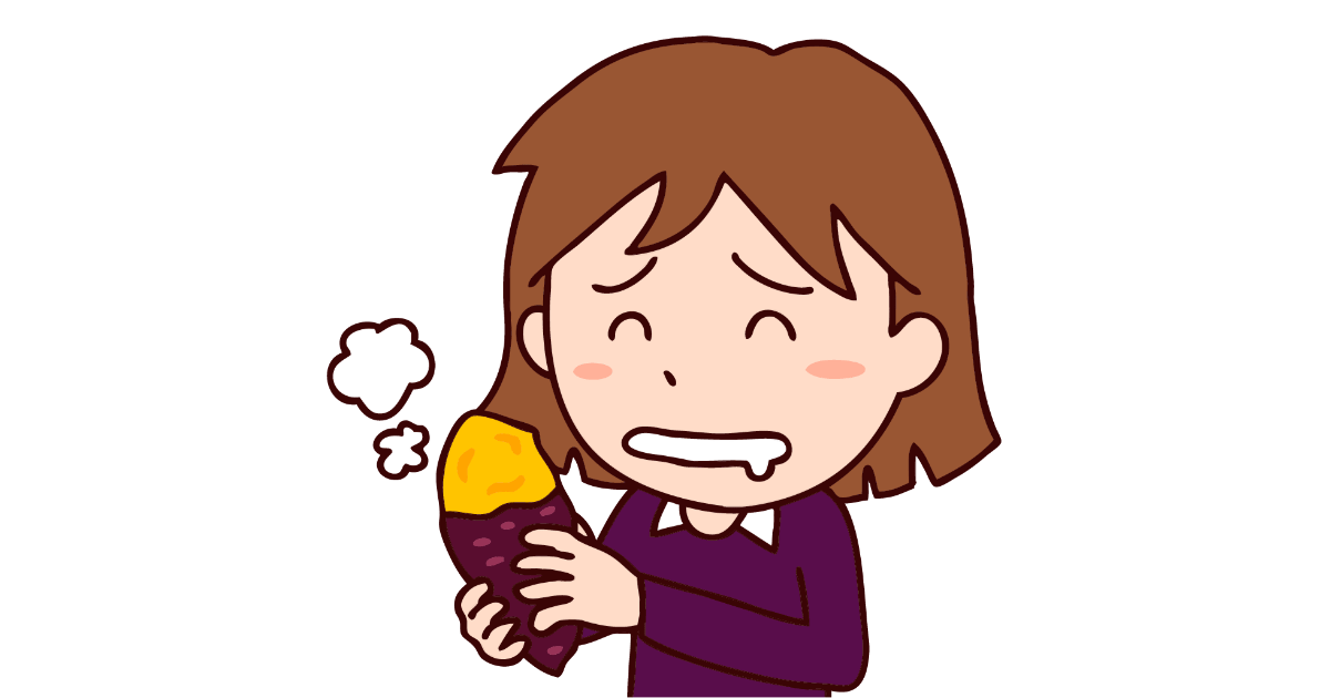 焼き芋を食べる女性