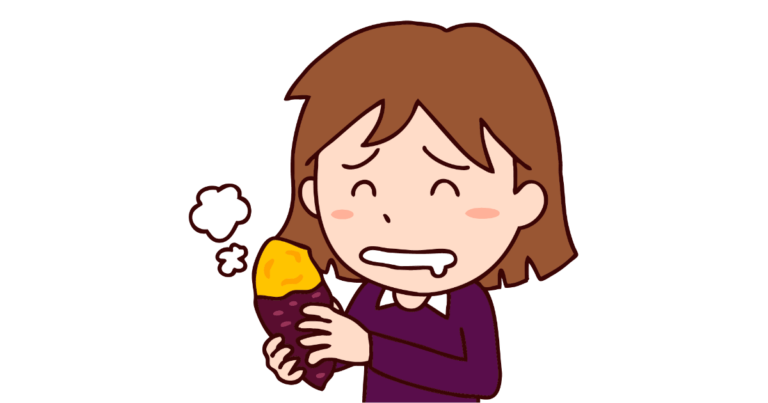 焼き芋を食べる女性