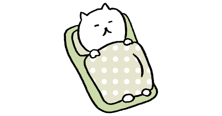 寝るネコ